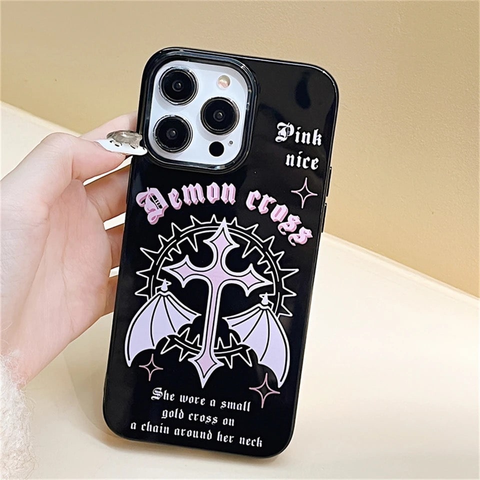 Black rubber gothic iPhone case with pink wings. Durable and protective Y2K punk phone cover for iPhone 6 to 15 models.