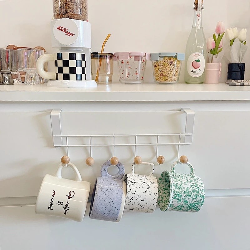 Wall mounted coat rack with boho hooks, perfect for organizing coats and bags