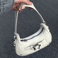 White star Y2K retro leather bag for women. Stylish underarm handbag with zipper closure and adjustable strap for casual outings.