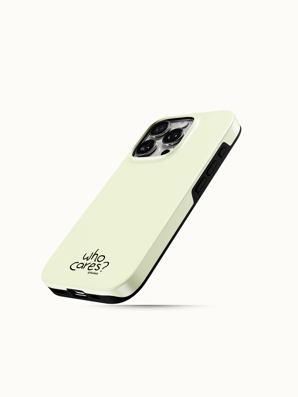 Butter yellow iPhone case with a tiny black who cares print near the bottom, angled view