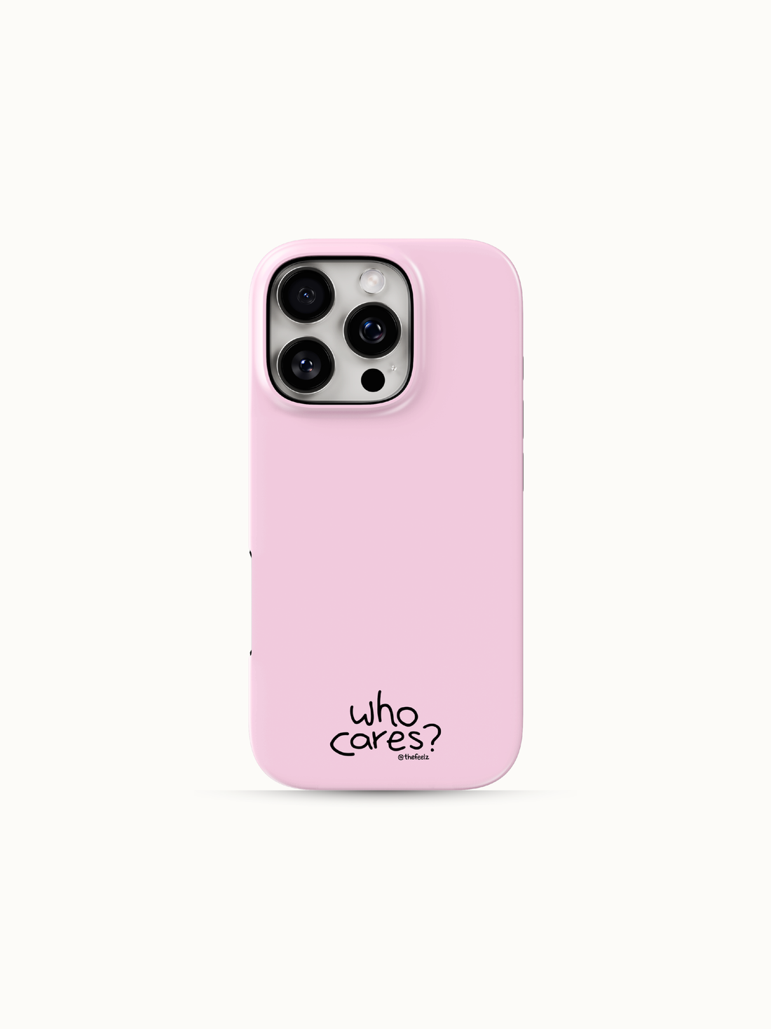 Pastel pink iPhone case with a tiny black who cares print near the bottom, back view