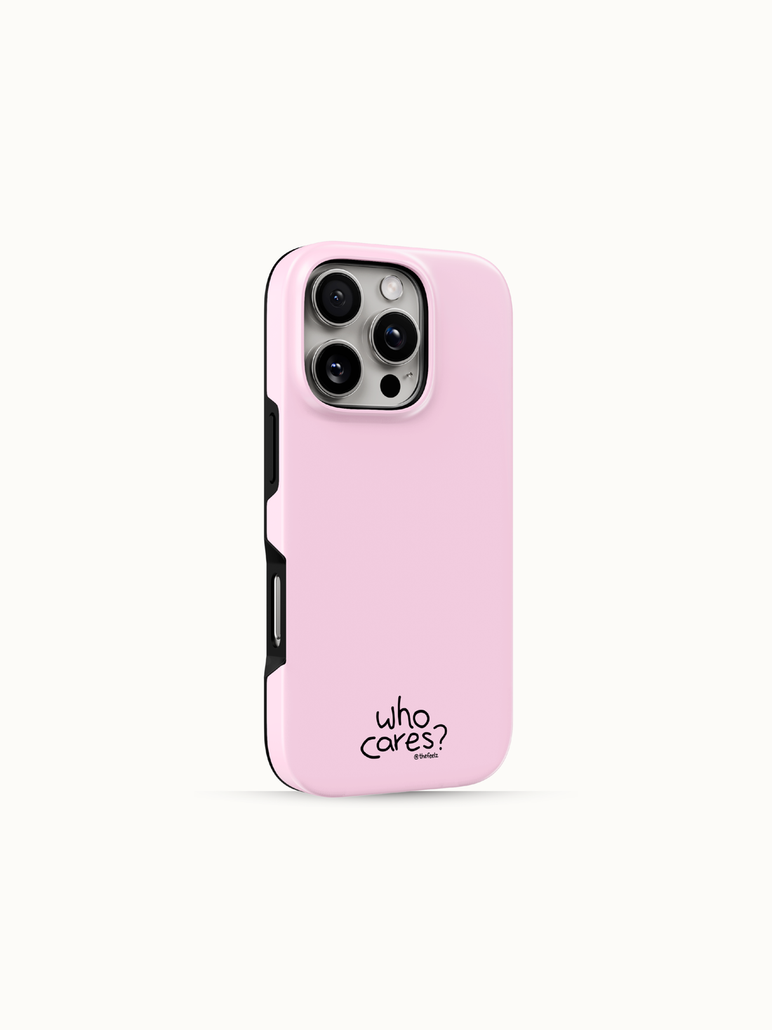 Pastel pink iPhone case with a tiny black who cares print near the bottom, back view