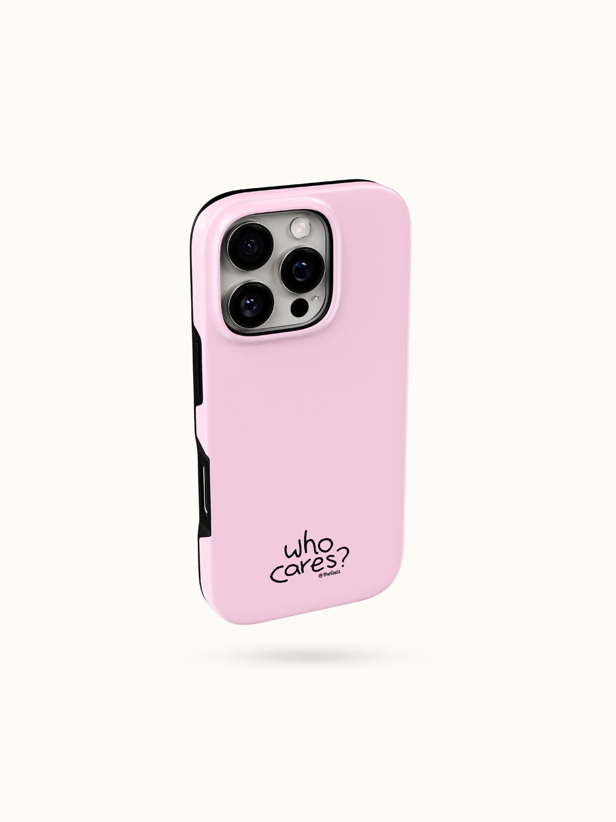 Pastel pink iPhone case with a tiny black who cares print near the bottom, three-quarter back view with camera cutout