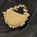 Women’s summer bag with pearls and straw