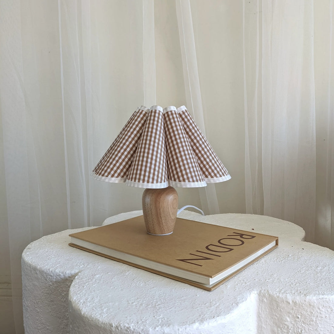 Wooden table lamp with pleated lampshade and LED light. Perfect bedside night lamp for bedroom, living room, and Nordic decor.