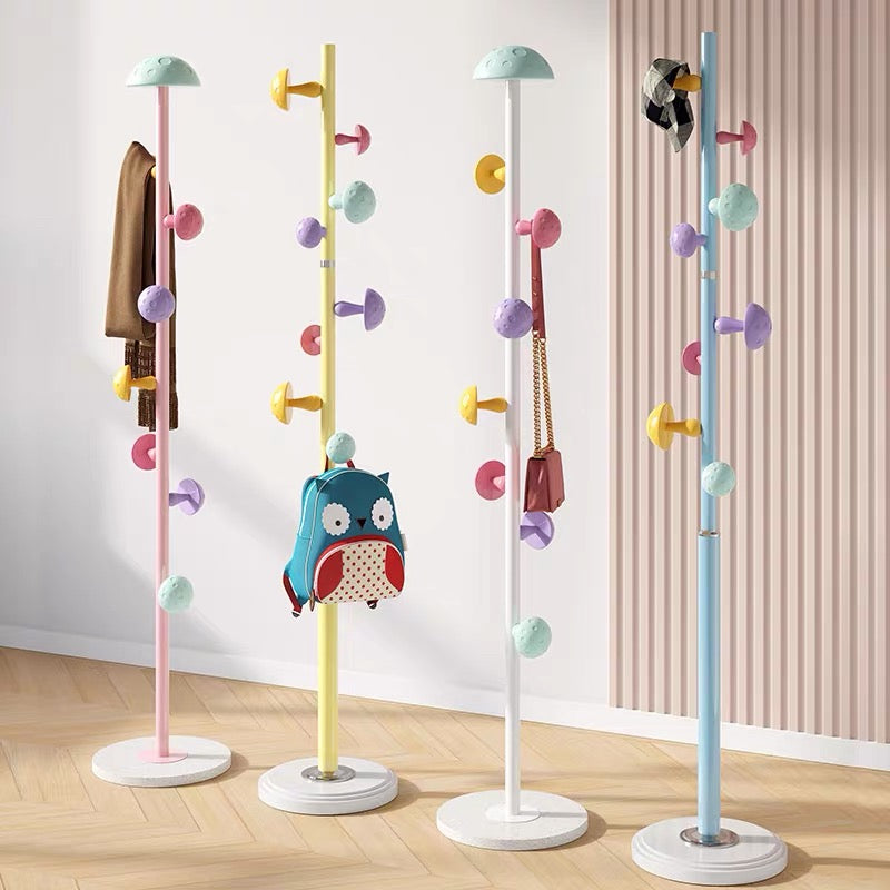 Modern pastel cartoon-themed clothes rack