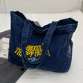 Y2K denim crossbody bag with a grunge vibe