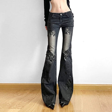 Subculture style Y2K denim pants with a bold floral pattern and distressed look