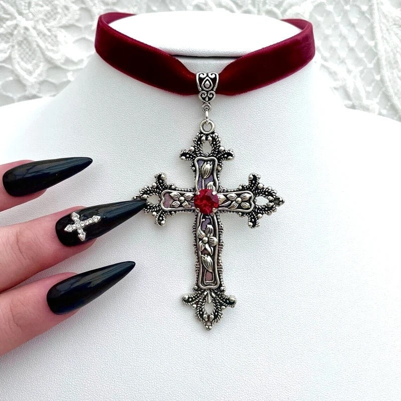 Punk-inspired velvet choker necklace with cross pendant. Ideal Gothic jewelry piece for Halloween or Y2K grunge fashion.