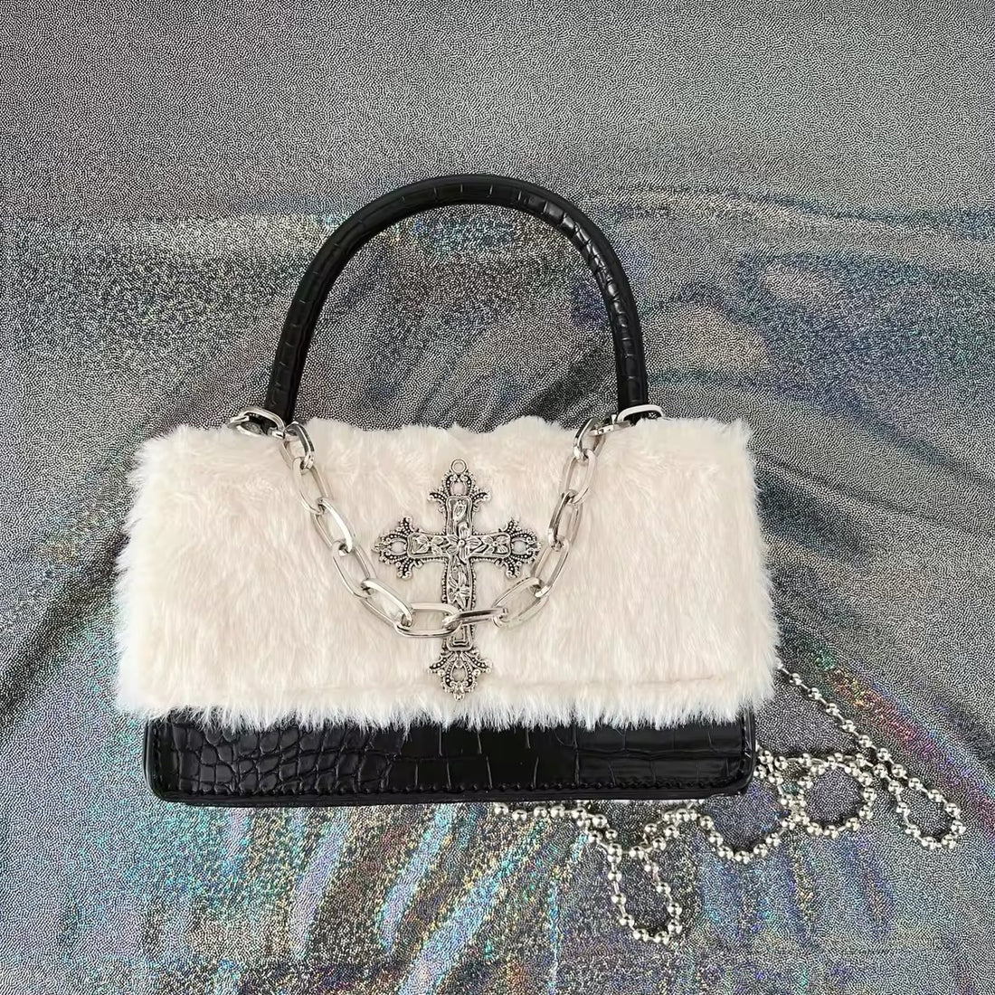 Y2K Gothic handbag with plush leather and cross applique. Grunge crossbody bag with chain strap for women’s Harajuku-inspired style.