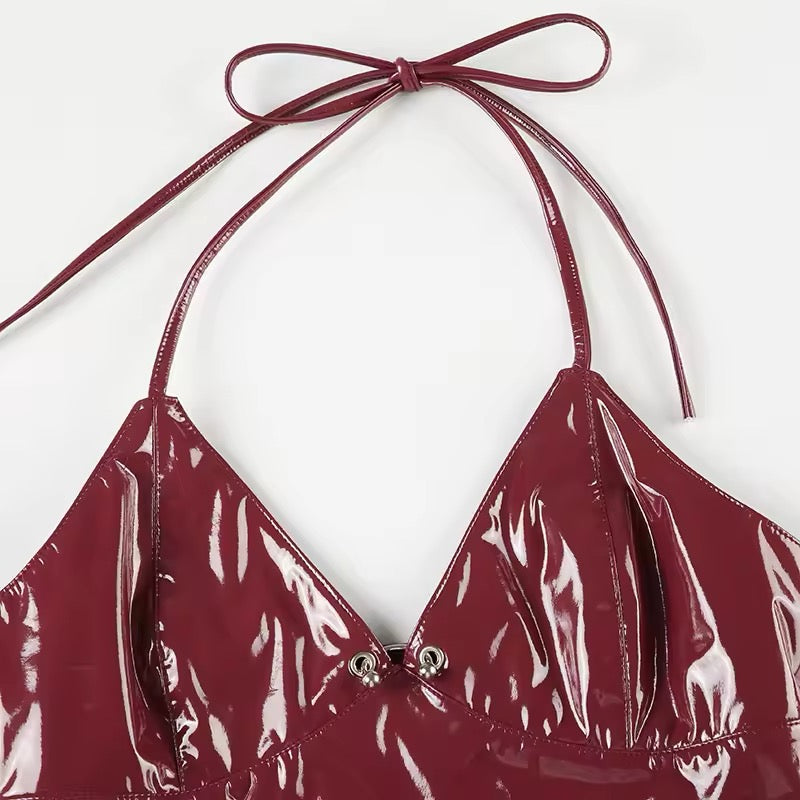 Y2K Red Leather Crop Top showcasing edgy faux leather design and bold halter neckline