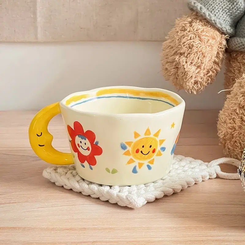 Yellow ceramic mug with hand-painted ladybug design. Korean style coffee cup with moon handle, perfect for kids and couples.