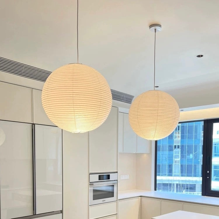 Traditional Japanese rice paper pendant light with aesthetic round lantern shape, ideal for cozy, calming living spaces